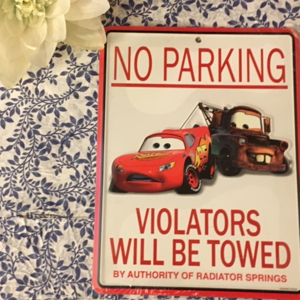 Tin sign from the movie cars